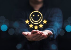 Businessman holding smile with five stars